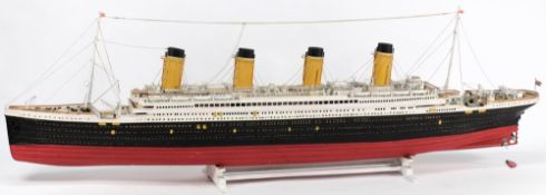 A scale model of the White Star liner RMS Titanic:, fully detailed with aerial masts, davits,
