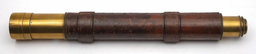 A 2 1/2 inch leather cased two draw telescope by Ross, London number '29777':,