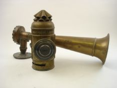 A Victorian brass hand held 'Boat -Signal lantern' with clear bull's eye lens,