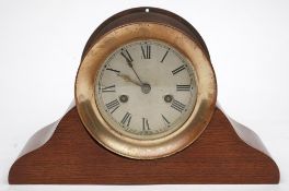 An American brass cased Ship's Watch clock by by Waterbury Clock Co, USA:,