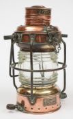 A copper and brass 'Anchor' lamp by Simpson Lawrence & Co Glasgow:,