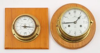 A brass cased 'Royal Mariner' bulkhead clock by Schatz,