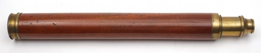 A 2 1/2 inch mahogany cased 'Day or Night; single draw telescope by Proctor Beilby & Co, London:,