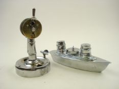 A nickel plated cigar cutter with everlasting match in the form of a ship's telegraph,