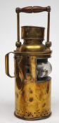 A 19th century brass signal lamp:, unsigned,