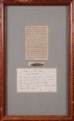 A framed section of timber from HMS Victory:,