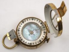 A brass Mills Mk 1 pocket compass:, with abalone dial in case, marked as per title to reverse.