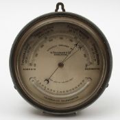 A bulkhead aneroid barometer designed by G Falconer & Co, Hong Kong:,
