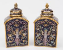 A pair of Meissen teapoys and covers: painted and 'jewelled' in Limoges enamel style with winged
