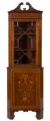 An Edwardian mahogany and marquetry standing corner display cabinet:,