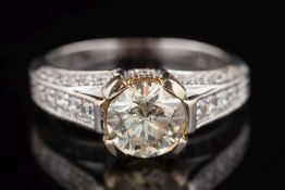 A diamond single-stone ring: with central round brilliant-cut diamond stated to weigh 1.