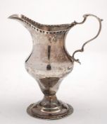 A George III silver pedestal cream jug, maker Benjamin Montigue, London,
