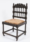 A 19th Century Indo Colonial carved ebonised side chair:,