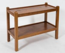 By Robert Thompson of Kilburn 'The Mouseman' - An oak rectangular two tier trolley:,