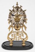 A Victorian scroll-leaf skeleton clock: having an eight-day duration timepiece single-fusee