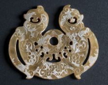 A Chinese calcified jade amulet: in archaic Han Dynasty style,