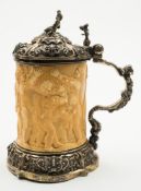 A 19th century Austrian ivory and silver mounted tankard,