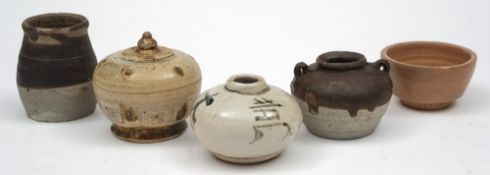 Five various Oriental jars and a bowl: comprising a globular jar and cover painted in blue with