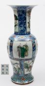 A Chinese porcelain yen yen: decorated in under glaze blue and famille verte enamels,