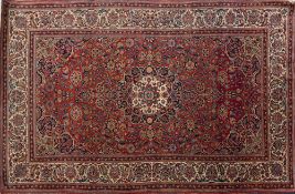 A Kashan rug:,