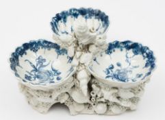 A Bow pickle dish: modelled with three shell shaped trays printed in blue with flowers within a