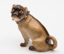 A Continental porcelain pug modelled after J.J.