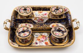 A unusual Davenport porcelain desk set: in the form of a two-handled tray with four covered