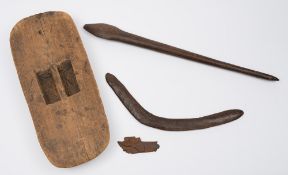An Aboriginal wooden shield of Gulmari type: of oval outline with domed front and cut-in handle to