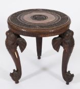 An Indian carved hardwood circular occasional table:,