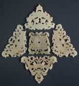 A group of five Chinese celadon jade pendants: in archaic Warring States style,