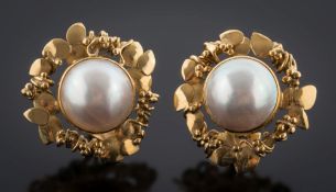 A pair of 18ct gold and single mabé cultured pearl earrings: each with a single mabé cultured pearl