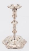 A George III cast silver taper stick, maker's mark worn possibly John Cafe, London,