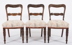 A set of five early Victorian Colonial carved rosewood dining chairs:,