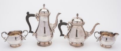 An Elizabeth II silver four-piece tea and coffee service: maker BES Co, Birmingham,
