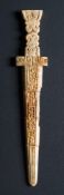 A Chinese archaic-style stone dagger pendant: carved with taotie masks and scrollwork,