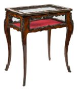 A 19th Century French kingwood and gilt metal mounted bijouterie display table:,