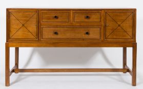 By Heal & Son Ltd - A mahogany and ebony strung rectangular sideboard:,