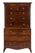 A George III mahogany secretaire tallboy:, the upper part with a moulded dentil cornice,