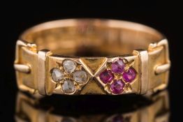 A late Victorian 15ct gold, ruby and diamond buckle ring: with quatrefoil clusters of stones,