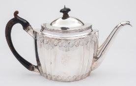 A George III silver teapot, maker John Robins, London, 1800: of oval outline,