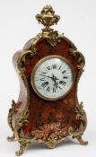 A French red boulle mantel clock: the eight-day duration movement striking the hours and half-hours