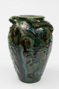 A C H Brannam vase (Barnstaple) pottery vase: of oviform with three asymmetric handles sgrafitto