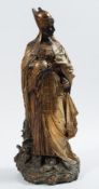 A large German terracotta gilt decorated figure of an Assyrian king: wearing traditional robes,