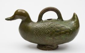 A Chinese green glazed pottery vessel in the form of a duck: in Tang Dynasty style,