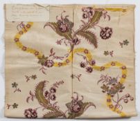 A late 18th century floral embroidered panel by repute a piece of Queen Charlotte's dress: the
