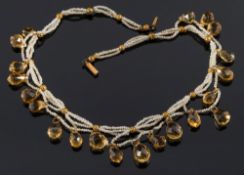 A 19th century seed pearl and citrine necklace: interspersed with single,