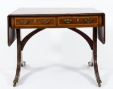 A 19th Century mahogany and satinwood crossbanded sofa table:, raised on trestle end supports.