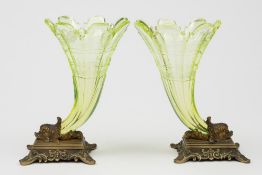 A pair of 19th century gilt brass and green glass Rhyton vases: with dolphin head terminals on