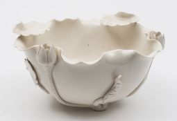 A Chinese blanc de Chine Dehua lotus bowl: in the form of a lotus flower with applied buds,