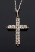 A mid 19th century silver and paste-set pendant cross: with cushion-shaped foil-backed paste in